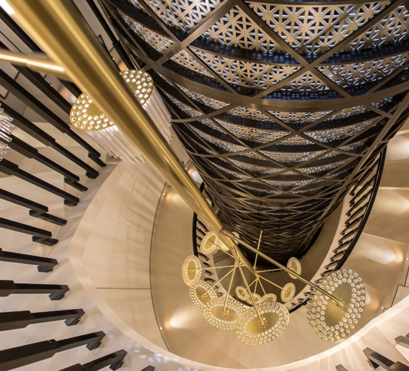 A contemporary stairwell chandelier by Baroncelli